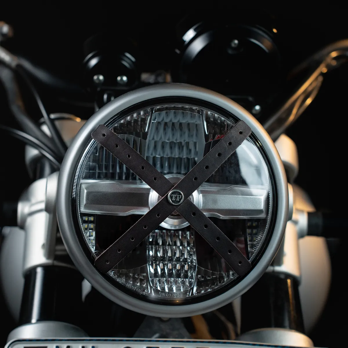 Perforated Headlight Cross — Handcrafted Leather Motorcycle Accessory by Tanners Pride